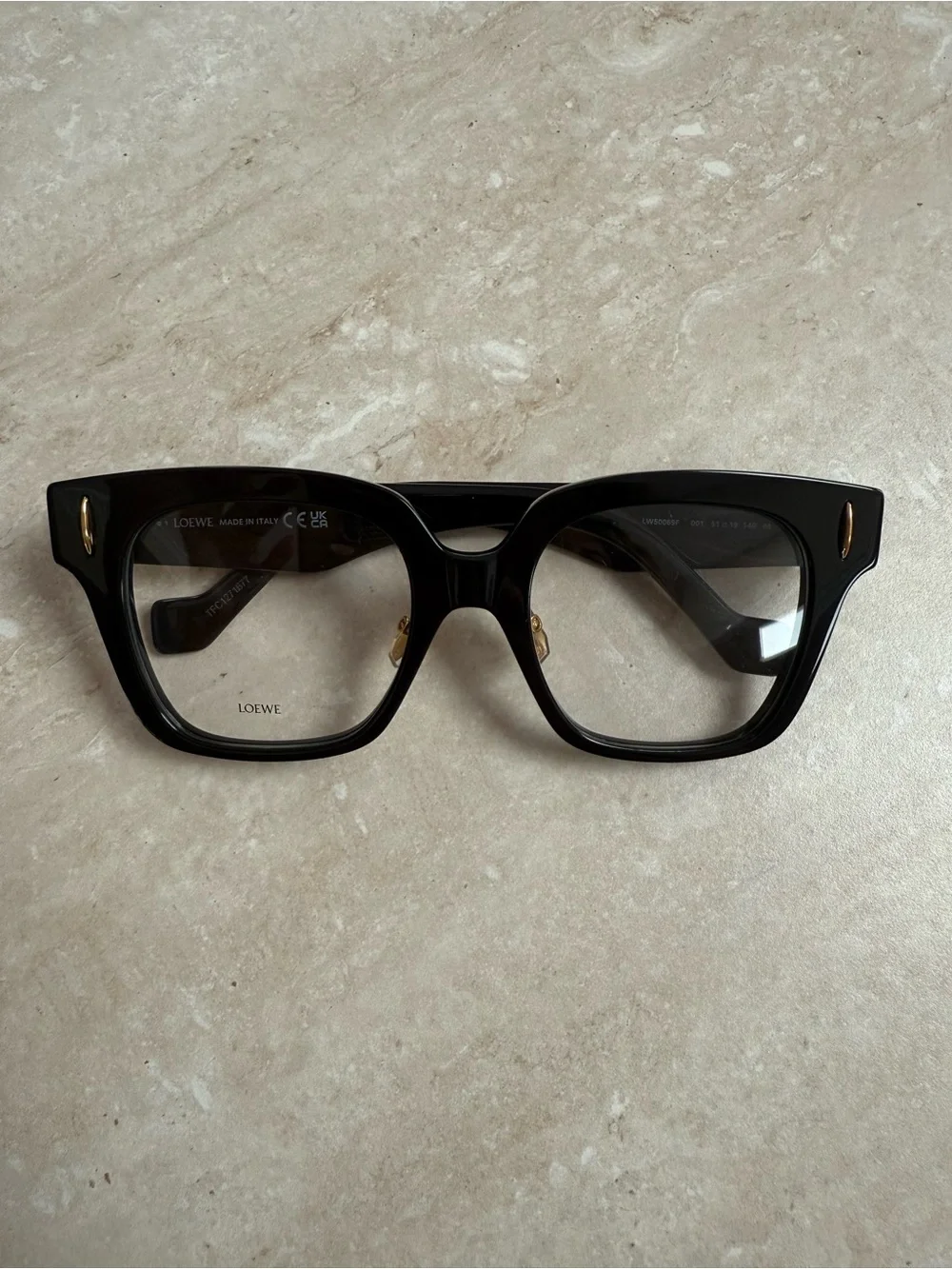 Loewe Black Glasses with Gold Anagram Logo.